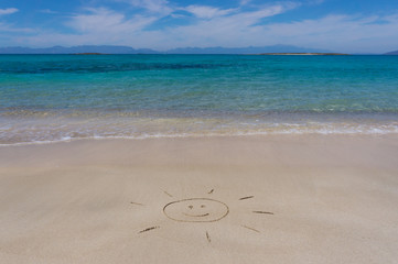 Fototapeta na wymiar Sun drawing in the sand