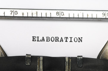 word elaboration  typed on old typewriter