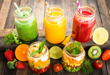 Healthy fruit and vegetable salad and smoothies in the jar