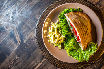 Doner Kebab - grilled meat, bread and vegetables. with salad of cabbage. And a refreshing drink Airan