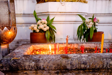 Buddhism, Thailand Religion. Burning Incense Aroma Sticks In Urn ( Pot ) As Offerings To Gods In Wat Pho public temple, Bangkok, Thailand. Praying At Thai Temple. Religious Symbol. 