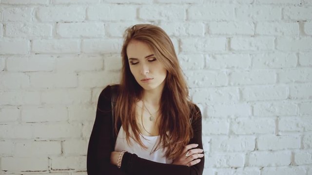 a pretty young girl is upset and sad