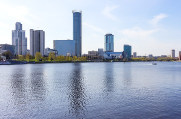 Fototapeta na wymiar Ekaterinburg pond skyscrapers summer sunny day