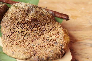Honeycomb with the natural on green leaves.