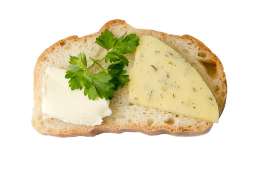 Bread with butter and cheese isolated on white background