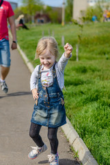 Fototapeta premium Little boy and girl having fun outdoors