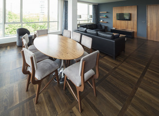 table in open plan living room of a luxury duplex apartment