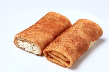Rolled Pancakes with curd isolated 