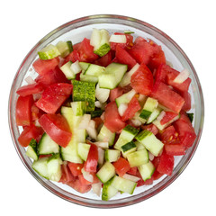 Vegetable salad with onion, tomato and cucumber isolated on white