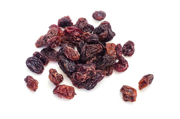 Dried raisins on a white background