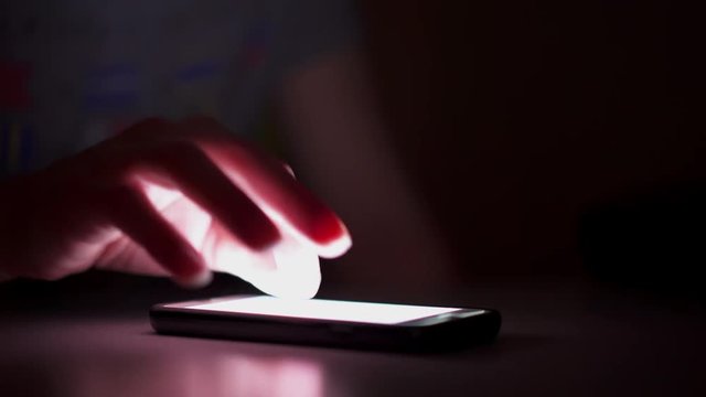 Smart phone used in dark, a little bit of covert browsing at night.
