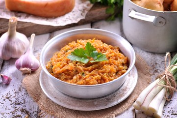 Squash caviar of organic zucchini, onions, carrots and tomatoes with garlic and parsley
