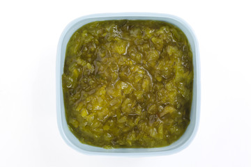 a bowl with crushed pickles