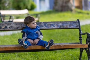 baby on park bench