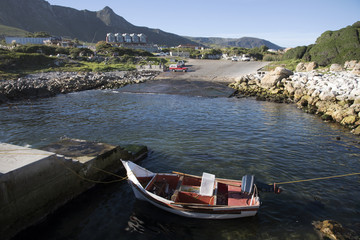 Fototapeta na wymiar KLEINMOND HARBOR WESTERN CAPE SOUTH AFRICA - APRIL 2016 - The small harbour in the popular holiday coastal town of Kleinmond in Southern Africa