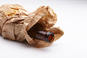 beer bottle in the paper bag