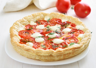 Tomatoes pie with cheese and dill