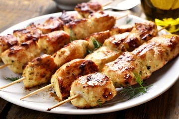 Grilled chicken on bamboo skewers