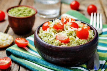 Pesto rice with tomatoes and cheese