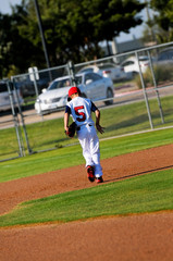 Baseball boy rear view.