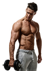 young handsome bodybuilder shirtless sports pants holding a dumb