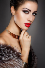 Fashion woman face with red lips and bright makeup