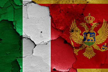 flags of Italy and Montenegro painted on cracked wall