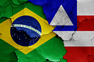flags of Brazil and Bahia painted on cracked wall