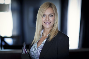 Blond Confident Businesswoman Working At The Office