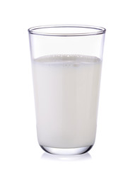 fresh milk in the glass on white background