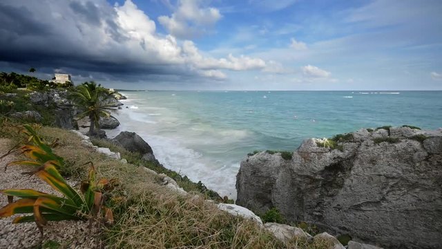 Time lapse of Ancient Tulum Mayan ruins in the Caribbean sea 