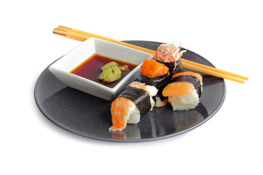 sushi on black plate