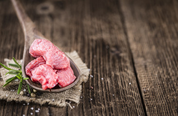 Wooden table with Chopped Beef fillet