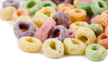 colorful cornflakes rings on white