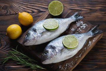 Raw dorado fish with lime, lemon, rosemary and sea salt