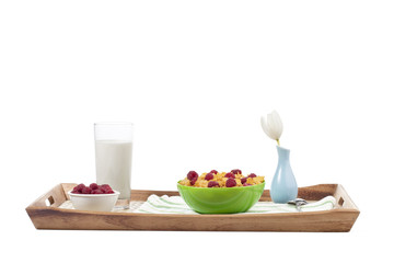 delicious breakfast cereals on the wooden tray