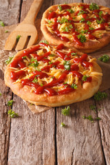 Homemade Hungarian langos with cheese and ketchup close-up. vertical
