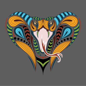 Patterned colored head of the King Cobra. African, indian tattoo design. It may be used for design of a t-shirt, bag, postcard and poster.
