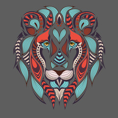 Patterned colored head of the lion. African / indian / totem / tattoo design. It may be used for design of a t-shirt, bag, postcard and poster.