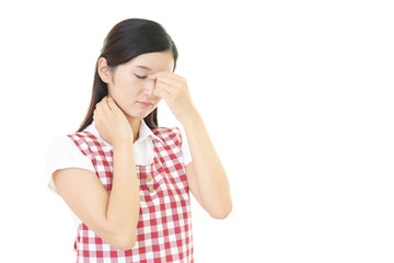 疲れた表情の主婦