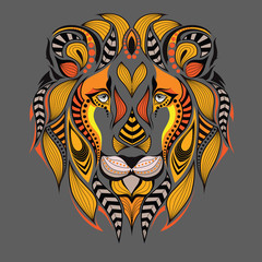 Naklejka premium Patterned colored head of the lion. African / indian / totem / tattoo design. It may be used for design of a t-shirt, bag, postcard and poster.