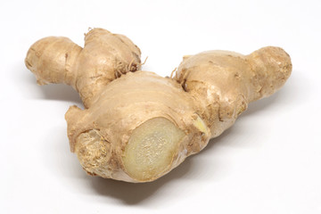 cut ginger on white