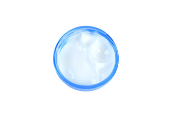 tub with a face cream with a blue cover on a white background