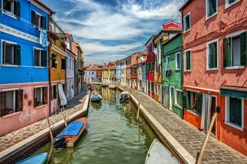 Fototapeta na wymiar The Empty Canals of Burano, Italy Sparkle on a Summer Day