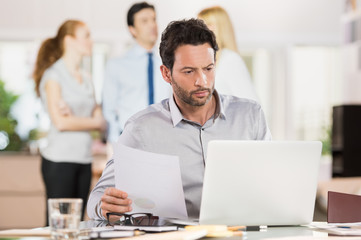 Businessman working on laptop