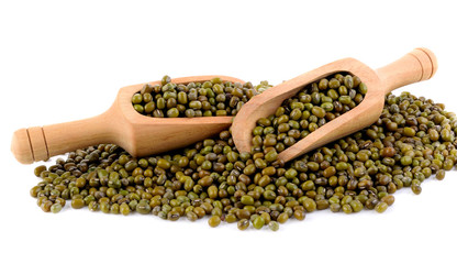 Green mung beans in scoops on white background