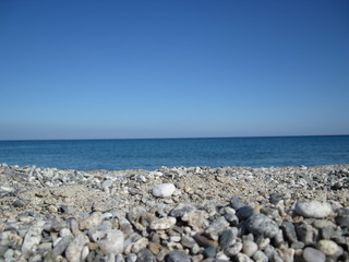 Fototapeta na wymiar Spiaggia di sassolini