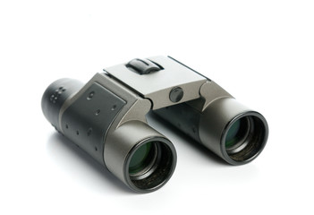 Pair of old binoculars isolated on white background