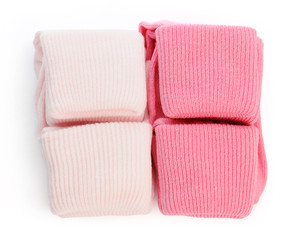 colorful of new kid's baby socks stacked and isolated