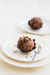 Chocolate Ice Cream Scoop is laying on Chocolate Homemade Bow